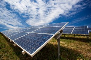 Solar panel field and blue sky